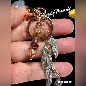 Indigenous feel feathers and pink keychain